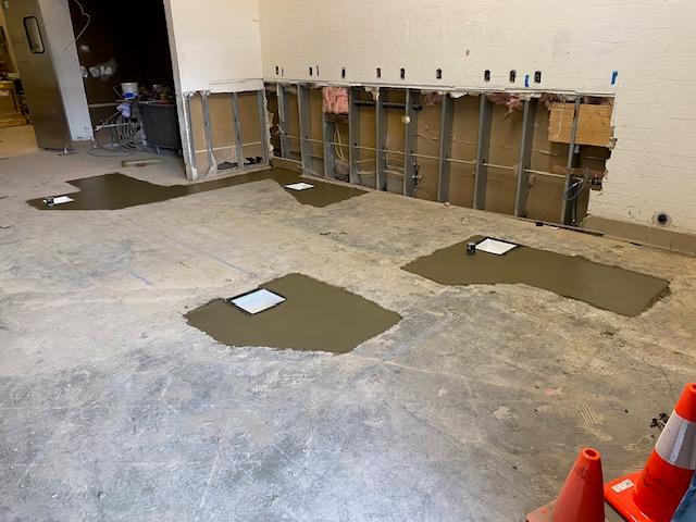 Concrete patch work in a shop